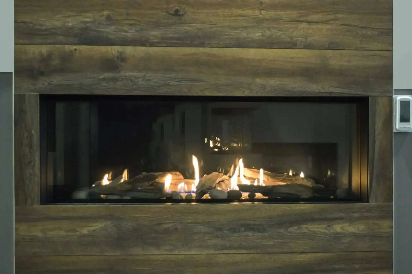Sierra-Flame-by-Amantii-Vienna-60-Direct-Vent-Linear-Style-Propane-Gas-Fireplace_f61c5421-efcd-481a-ad1e-5c06d20fc9a4.jpg Sierra Flame by Amantii Vienna 40" Direct Vent Linear Style Propane Gas Fireplace - Image 1